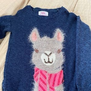 Justice sweaters and